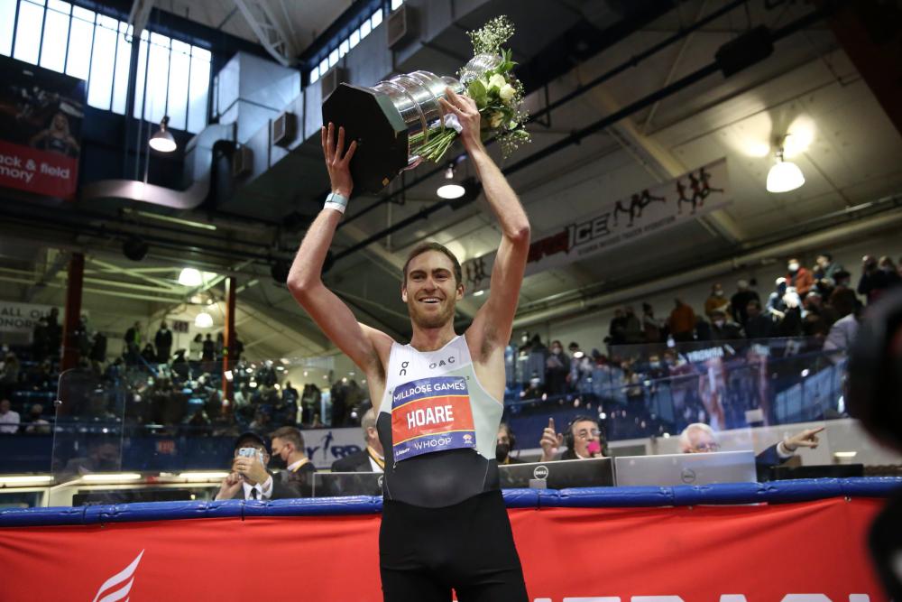 Ollie Hoare lifts trophy at 2023 Millrose Games.